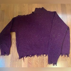 Distressed sweater